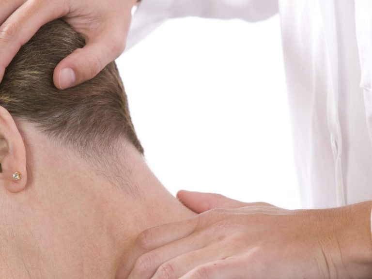 Image of human neck with manual testing/stretching